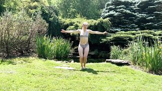 Sexy Yoga Dance Flow Woman in Bikini Lingerie by a Waterfall Pond in Nature