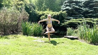Sexy Yoga Dance Flow Woman in Bikini Lingerie by a Waterfall Pond in Nature
