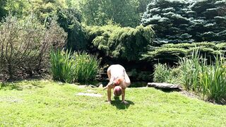 Sexy Yoga Dance Flow Woman in Bikini Lingerie by a Waterfall Pond in Nature